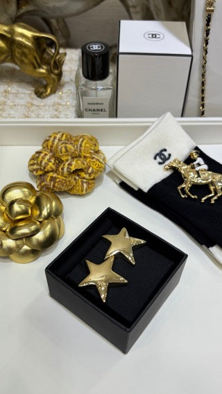 CHANEL Stellaire Gold Star Stud Earrings