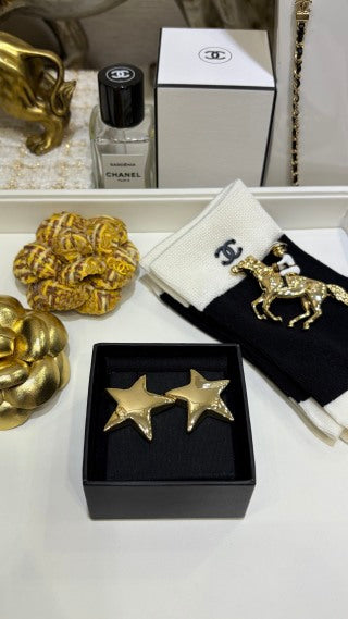 CHANEL Stellaire Gold Star Stud Earrings