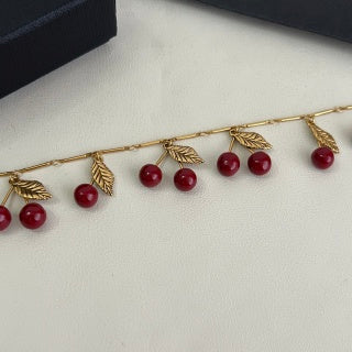 YSL Cherry Charm Gold Chain Bracelet
