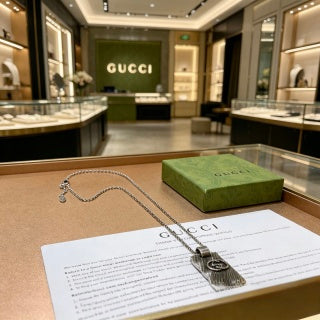 Gucci Interlocking G Winged Skull Pendant Necklace