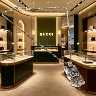 Gucci Interlocking G Winged Skull Pendant Necklace