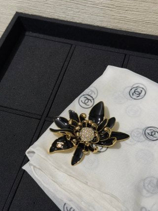 Chanel Black Camellia Flower Brooch – Elegant Luxury Fashion Accessory