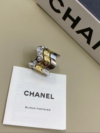 CHANEL Gold and Silver Two-Tone Wave Ring
