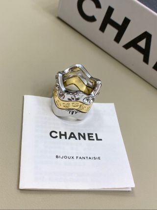 CHANEL Gold and Silver Two-Tone Wave Ring