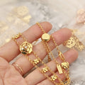 CHANEL Golden Charm Cascade Layered Bracelet