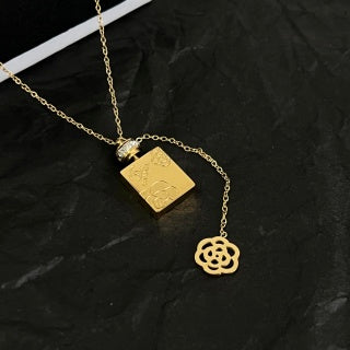 CHANEL Asymmetric Charm Pendant Necklace