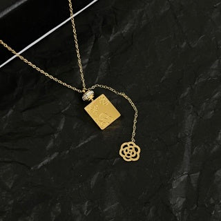 CHANEL Asymmetric Charm Pendant Necklace