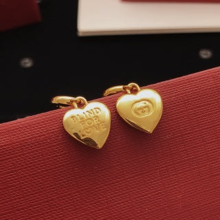 Gucci Heart Charm Interlocking G Hoop Earrings