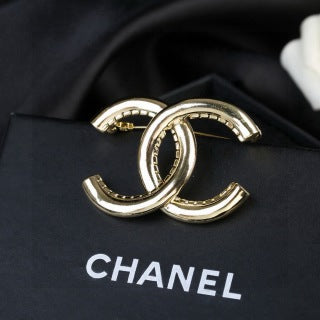 CHANEL Golden Interlock CC Sculptural Brooch