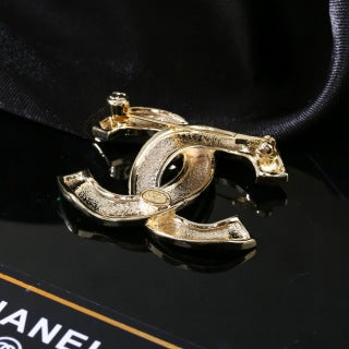 CHANEL Golden Orbit CC Sculptural Brooch