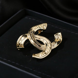 CHANEL Golden Orbit CC Sculptural Brooch