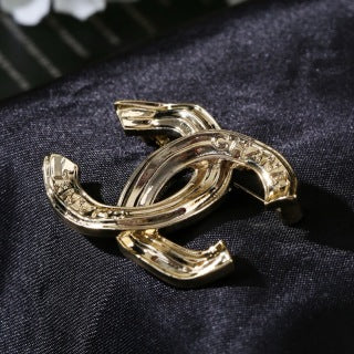 CHANEL Golden Orbit CC Sculptural Brooch
