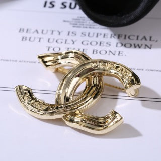 CHANEL Golden Orbit CC Sculptural Brooch