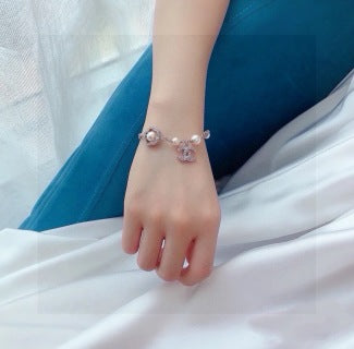 CHANEL Althea Pearl Charm Chain Bracelet