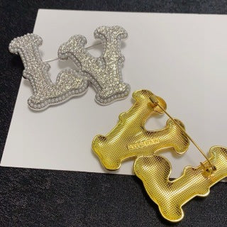 Louis Vuitton Crystal Monogram Letter Brooch