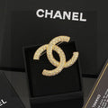 CHANEL Adrienne Radiant Emblem Brooch