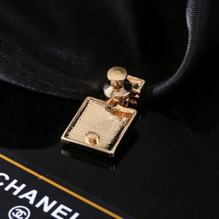 CHANEL Amara Fragrance Bottle Statement Brooch