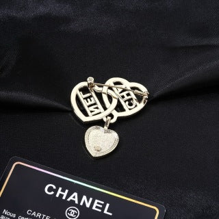 CHANEL Lucienne Heart Emblem Statement Brooch