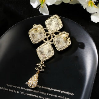 CHANEL Evelina Golden Cross Charm Brooch
