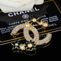 CHANEL Arabella Noir Floral Emblem Brooch