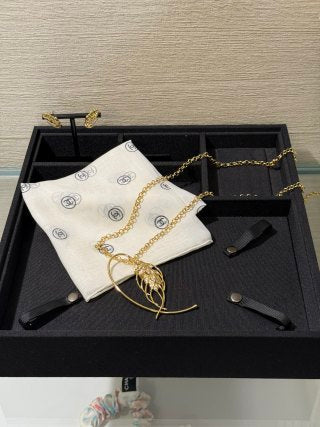CHANEL Golden Wheat Tassel Pendant Necklace