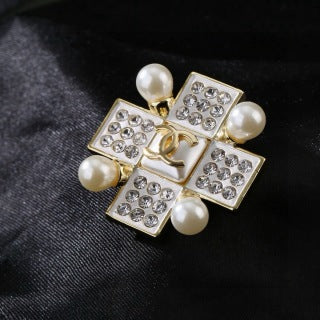 CHANEL Aureline Pearl Cross Emblem Brooch