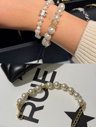Chanel light gold bracelet with white pearls and full pavé-set stones.