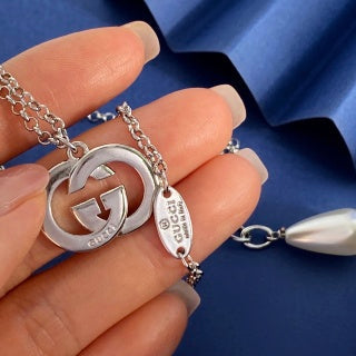 Gucci Interlocking G Crystal Medallion Necklace