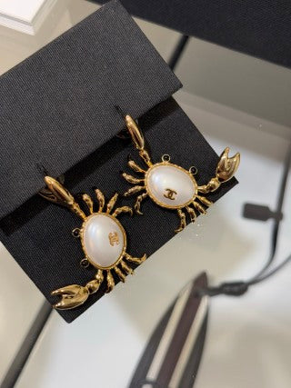 Chanel Gold-Tone Earrings with Crab and Shell Pearl
