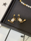 Chanel Gold-Tone Earrings with Crab and Shell Pearl