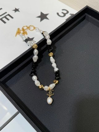 Chanel Black Enamel Double-C and Baroque Pearl Short Necklace