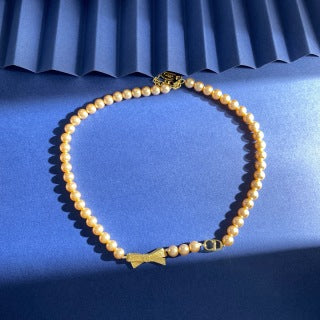 Dior Pearl Bow Charm Necklace