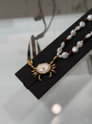 CHANEL Soleil Pearl Charm Necklace