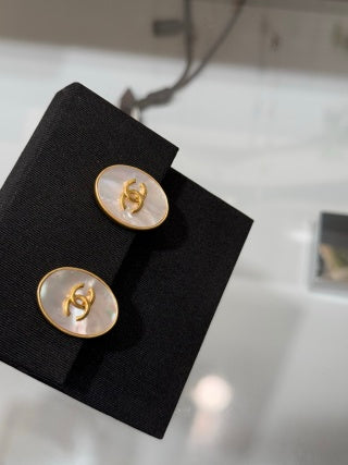 Chanel Vintage Gold-Tone Oval Clip-On Earrings with Natural Mother-of-Pearl