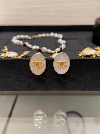 Chanel Vintage Gold-Tone Oval Clip-On Earrings with Natural Mother-of-Pearl