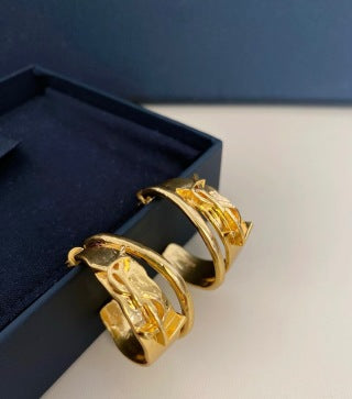 YSL Engraved Gold Cuff Hoop Earrings