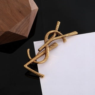 YSL Twisted Rope Monogram Gold Brooch