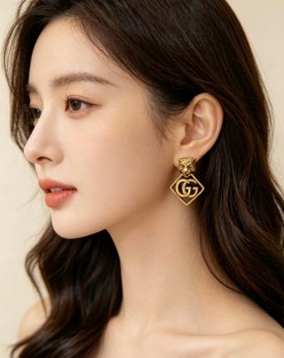 Gucci Interlocking G Lion Head Geometric Stud Earrings