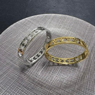 Louis Vuitton Monogram Cutout Cuff Bracelet