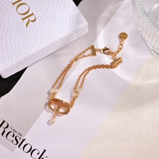 Dior CD Ribbon Gold Chain Bracelet
