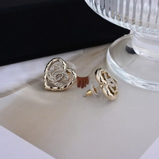 CHANEL Interwoven Heart CC Stud Earrings