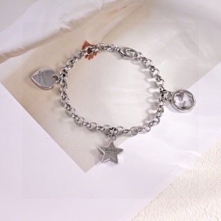 Gucci Interlocking G Star Charm Link Chain Bracelet