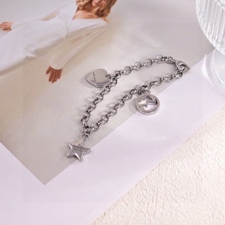 Gucci Interlocking G Star Charm Link Chain Bracelet
