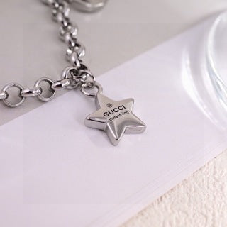 Gucci Interlocking G Star Charm Link Chain Bracelet