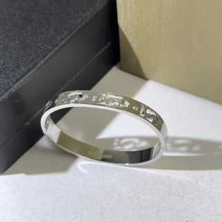 YSL Dual Tone Crystal Emblem Cuff Bracelet
