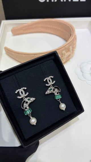 Chanel Silver Pearl Earrings with Dog Motif and Full Pavé Diamonds