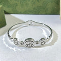 Gucci GG Triple Medallion Cuff Bracelet