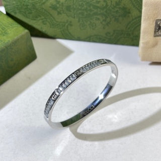 Gucci GG Engraved Silver Cuff Bracelet