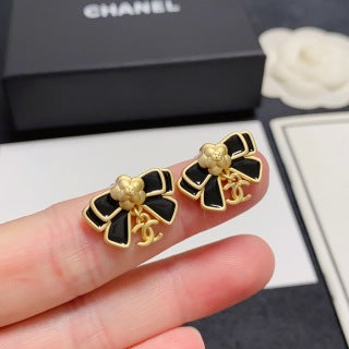 Chanel Camellia black bow stud earrings