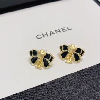 Chanel Camellia black bow stud earrings